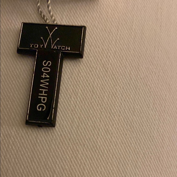 ToyWatch Gold and White Skull Design Watch - Picture 2 of 5